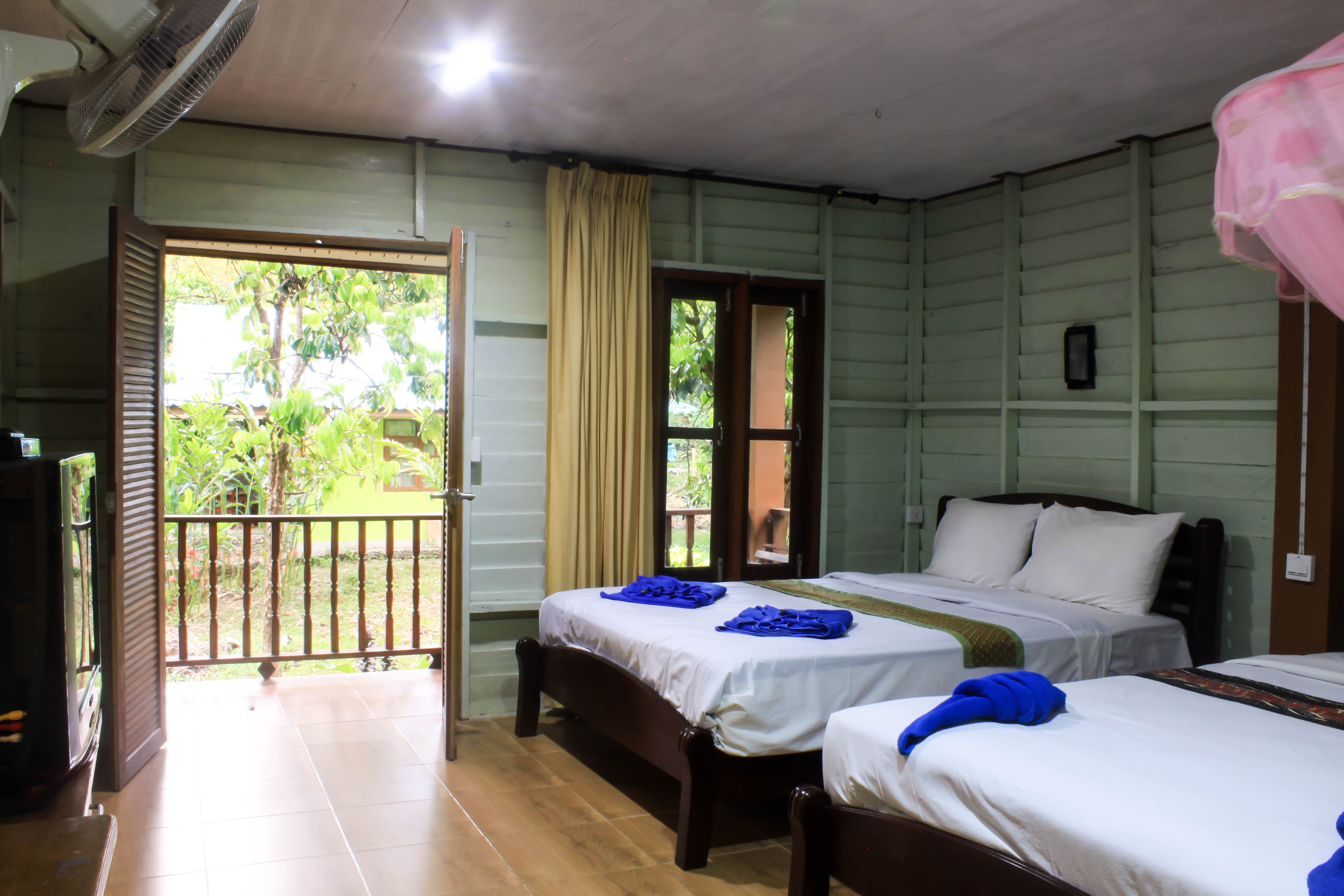 bed room wood cottage at khao sok